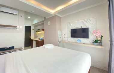 Sảnh chờ 2 Gorgeous Studio Room Apartment at Grand Asia Afrika By Travelio