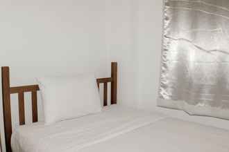 Kamar Tidur 4 Spacious and Nice 3BR at Meikarta Apartment By Travelio