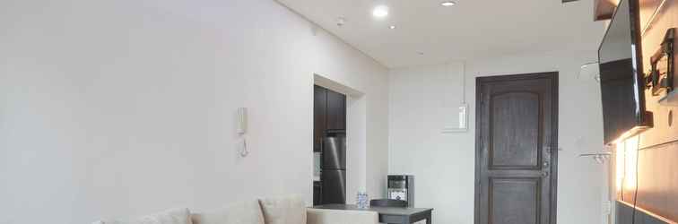 Lobby Minimalist and Comfort 3BR Apartment at Bellagio Residence By Travelio