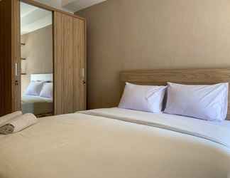 Bedroom 2 Tidy and Comfort 2BR at Cinere Bellevue Suites Apartment By Travelio