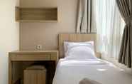 Bedroom 2 Tidy and Comfort 2BR at Cinere Bellevue Suites Apartment By Travelio