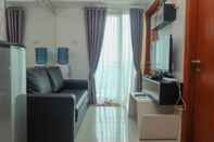 Ruang untuk Umum Elegant and Comfort 2BR at Woodland Park Residence Apartment By Travelio