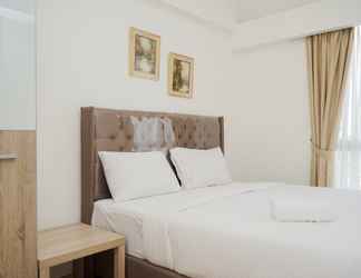 Bedroom 2 Comfort 2BR Apartment at Sky House BSD By Travelio