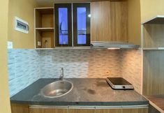 Common Space 5 Private Studio Room Apartment at Taman Melati Jatinangor By Travelio