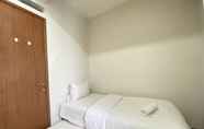 Bedroom 2 Cozy 2BR Apartment at Pinewood Jatinangor By Travelio
