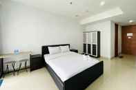 ห้องนอน Cozy Studio Room Apartment at Dago Suites By Travelio