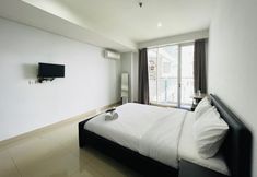 Lobby 5 Cozy Studio Room Apartment at Dago Suites By Travelio