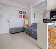 Common Space 4 Warm and Comfort 2BR at Bassura City Apartment By Travelio