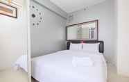 Kamar Tidur 6 Warm and Comfort 2BR at Bassura City Apartment By Travelio