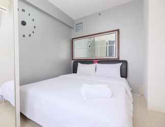 Bedroom 2 Warm and Comfort 2BR at Bassura City Apartment By Travelio