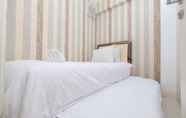 Bilik Tidur 7 Warm and Comfort 2BR at Bassura City Apartment By Travelio