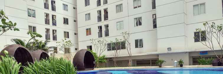 Lobby Warm and Comfort 2BR at Bassura City Apartment By Travelio