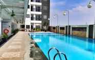 Swimming Pool 6 Private and Well Furnished 2BR Mekarwangi Square Cibaduyut Apartment By Travelio