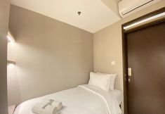 침실 2 Private and Well Furnished 2BR Mekarwangi Square Cibaduyut Apartment By Travelio