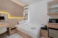 Bedroom Minimalist and Cozy Studio (No Kitchen) at Aeropolis Apartment By Travelio