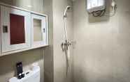 In-room Bathroom 6 Cozy Studio at Taman Melati Jatinangor Apartment by Travelio