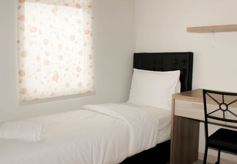Bedroom Spacious and Comfy 2BR at Springlake Summarecon Apartment Bekasi By Travelio