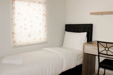 Bedroom Spacious and Comfy 2BR at Springlake Summarecon Apartment Bekasi By Travelio