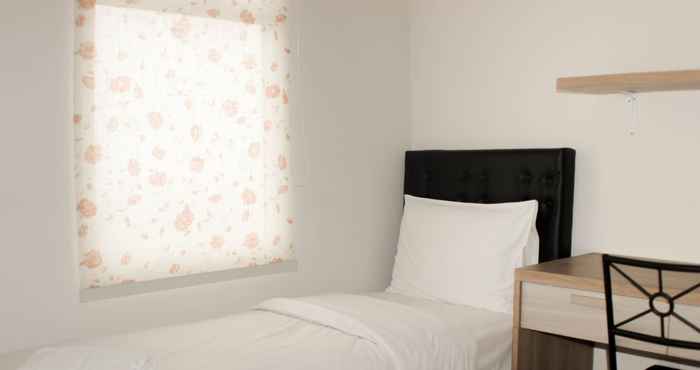 Bedroom Spacious and Comfy 2BR at Springlake Summarecon Apartment Bekasi By Travelio