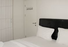 Bedroom 2 Spacious and Comfy 2BR at Springlake Summarecon Apartment Bekasi By Travelio