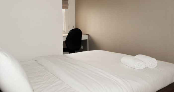 Bedroom Comfort and Minimalist 2BR at Springlake Summarecon Bekasi Apartment By Travelio