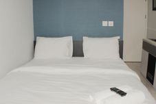 Bilik Tidur Best Choice Studio Room at Apartment Springlake Summarecon Bekasi By Travelio