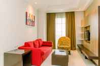 Ruang Umum Cozy Living 1BR Apartment The Bellezza By Travelio