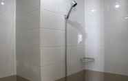 In-room Bathroom 4 Studio in front of Shopping Mall at Apartment Green Pramuka By Travelio