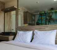 Bedroom 2 Studio in front of Shopping Mall at Apartment Green Pramuka By Travelio