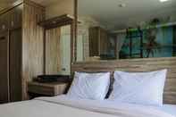 Bedroom Studio in front of Shopping Mall at Apartment Green Pramuka By Travelio