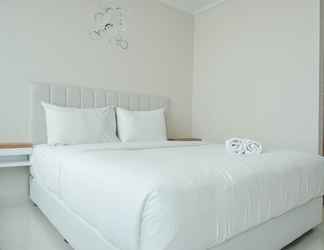 Bedroom 2 Comfort and Warm Studio Room at Green Sedayu Apartment By Travelio