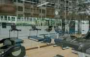 Fitness Center 5 Comfort and Warm Studio Room at Green Sedayu Apartment By Travelio
