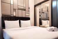 Bedroom Elegant and Nice Studio at Vida View Makassar Apartment By Travelio