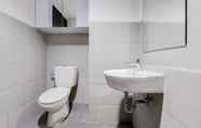 In-room Bathroom 3 Comfy and Elegant Studio at Bintaro Icon Apartment By Travelio