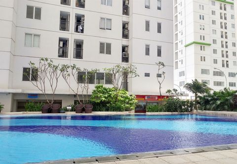 Lobby Comfy and Nice 2BR at Bassura City Apartment By Travelio