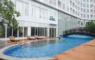 Kolam Renang 3 Serene Exclusive Modern Studio at Grand Sungkono Lagoon Apartment By Travelio