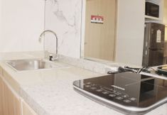 Common Space 6 Cozy and Serene 2BR at Meikarta Apartment By Travelio