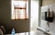 Common Space 3 Homey and Cozy Stay 2BR at Green Pramuka City Apartment By Travelio