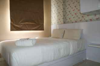 Kamar Tidur 4 Homey and Cozy Stay 2BR at Green Pramuka City Apartment By Travelio