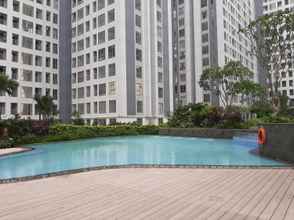 Hồ bơi 4 Best Deal Cozy 2BR M-Town Residence By Travelio