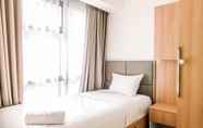 Kamar Tidur 5 Best Deal Cozy 2BR M-Town Residence By Travelio