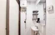 In-room Bathroom 3 Restful and Nice Studio Sky House BSD Apartment By Travelio