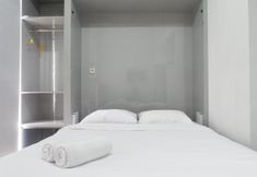 Bedroom 3 Stylish and Compact Studio Apartment at Taman Melati Surabaya By Travelio
