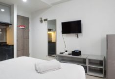 Bedroom 4 Stylish and Compact Studio Apartment at Taman Melati Surabaya By Travelio