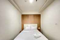 ห้องนอน Deluxe 2BR at Apartment Parahyangan Residence By Travelio