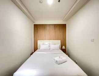 Bedroom 2 Deluxe 2BR at Apartment Parahyangan Residence By Travelio