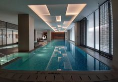 Swimming Pool 7 Nice and Fancy 1BR at Branz BSD Apartment By Travelio