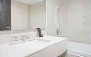 In-room Bathroom 5 Comfy and Stunning 1BR at Ciputra World 2 Apartment By Travelio