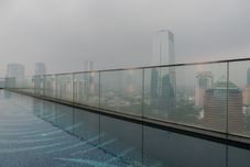 Swimming Pool Comfy and Stunning 1BR at Ciputra World 2 Apartment By Travelio