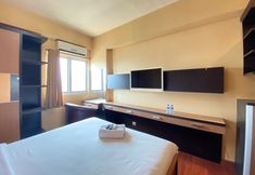 Phòng ngủ 2 Cozy Studio Apartment at Suites @Metro By Travelio